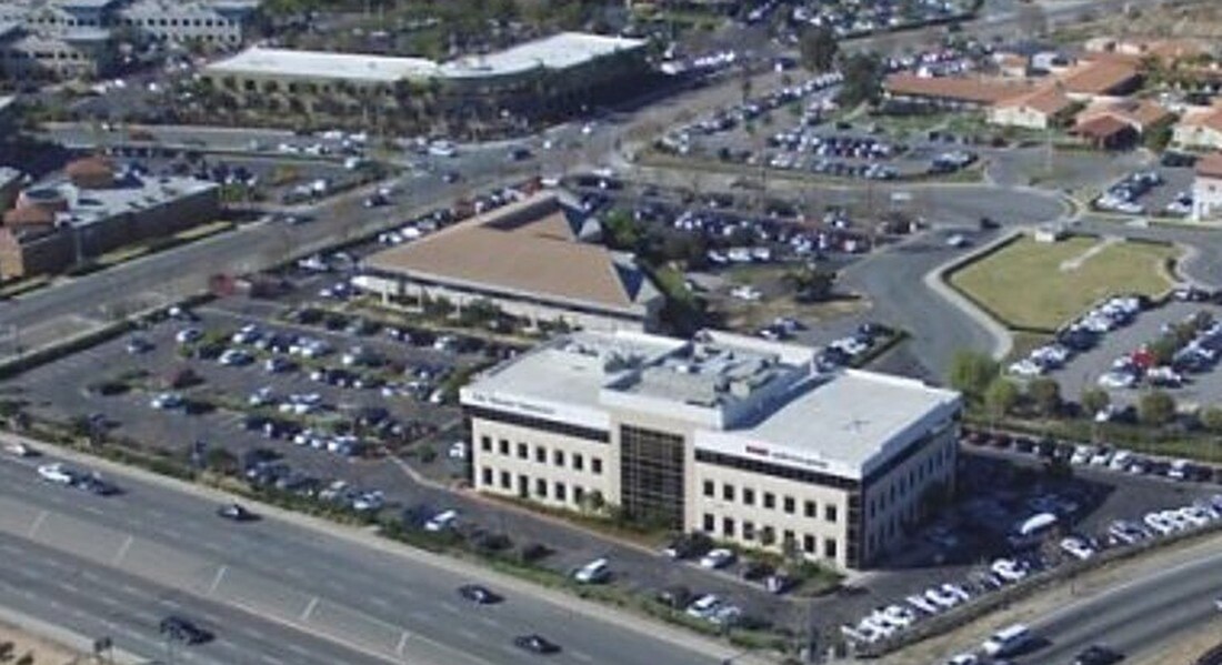 A professional office building and adjoining retail center in the firm's portfolio